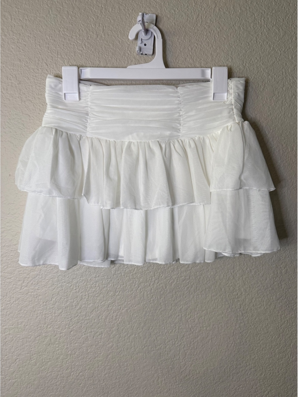 Halara Medium White Mini Skirt Pocket Shorts underneath
